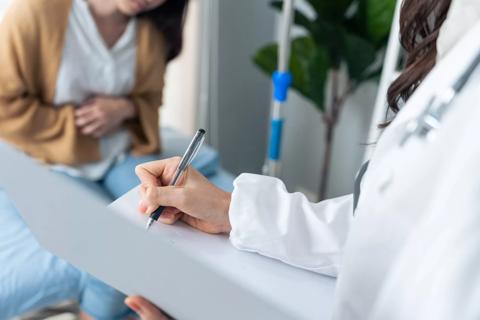 Doctor talking with patient