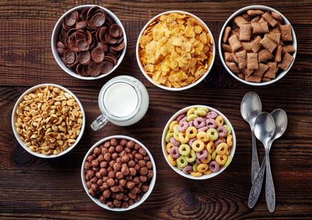 Variety of cereals in different bowls