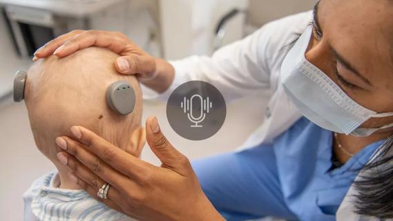 Child being fitted with cochlear implants