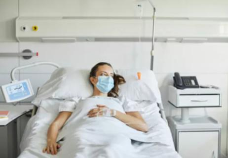 Woman in hospital bed