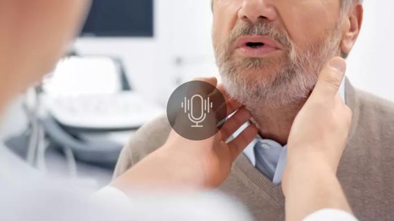 Clinician examining patient's jaw