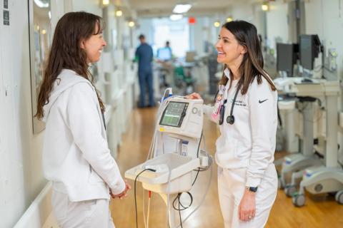 Nurses talking in hallway