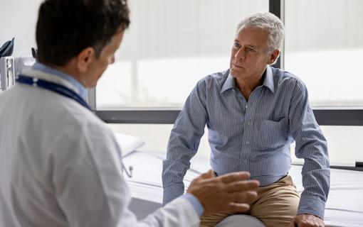 Physician speaking with patient