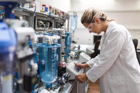 Woman working in an electronic laboratory