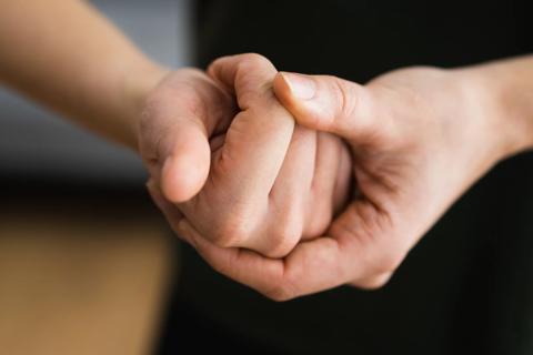 Hands of someone cracking their knuckles