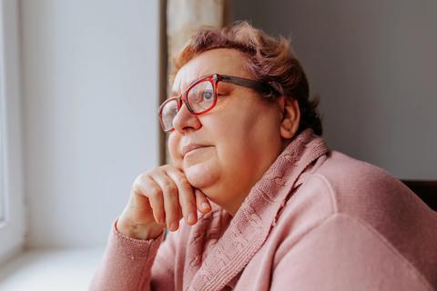 Older woman with obesity and glasses