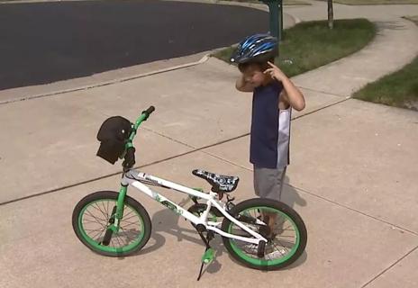 Child riding a bike.