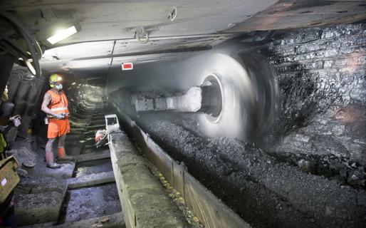 Coal miner in shaft