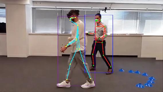 person walking with a stick-figure overlay on his body