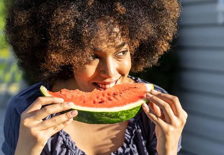 woman eating watermelon