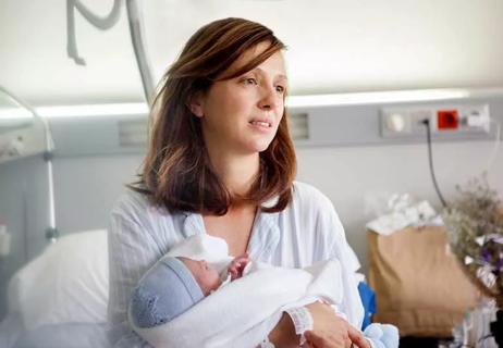 Depressed mother with newborn in hospital