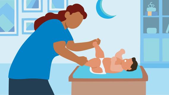 Parent doing bicycle legs on their fussy baby