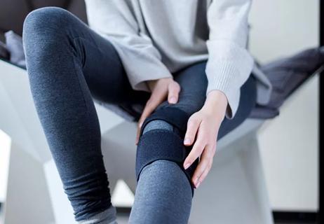 girl with knee brace for a torn meniscus