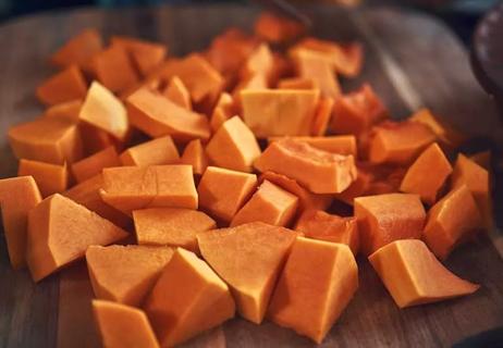 cut up butternut squash on tray