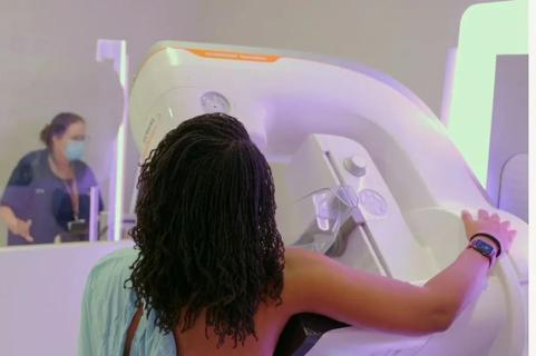 Woman getting mammogram