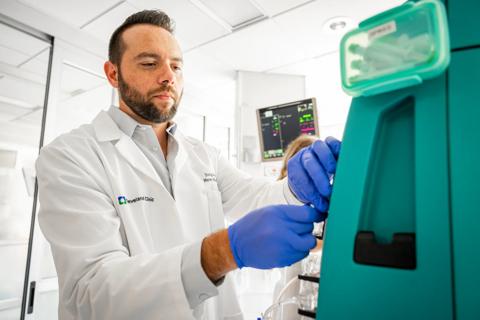 Nurse with dialysis machine