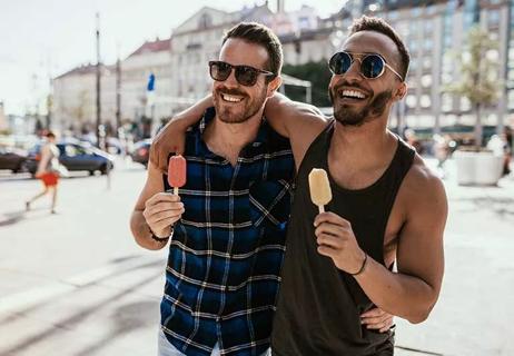 two men wearing sunglasses