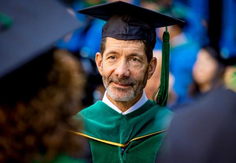Dr. Isaacson in cap and gown