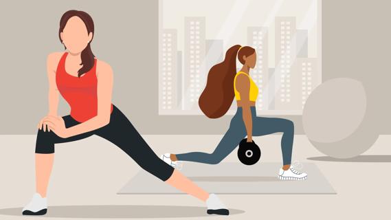 Two women exercising in a gym