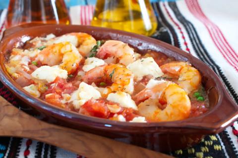 Grilled shrimp plate with tomatoes, feta and peas