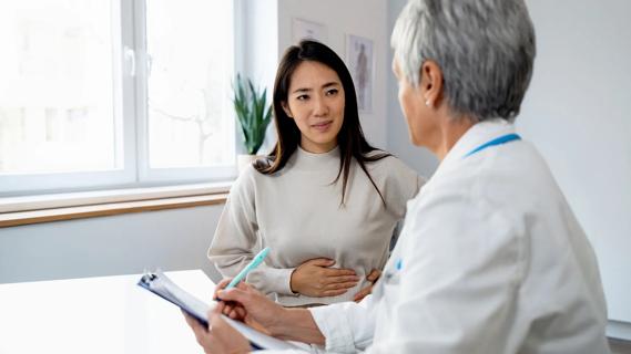 Physician speaking with patient