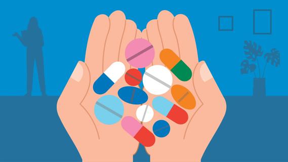 Two hands full of supplement tablets, pills and capsules, with healthcare provider in background