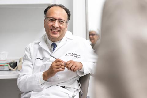 Dr. Hashmi with patient