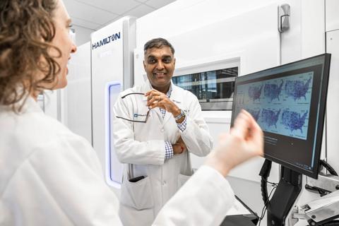 Khorna, MD, in lab