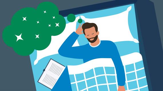 Man sleeping in bed with open book next to him