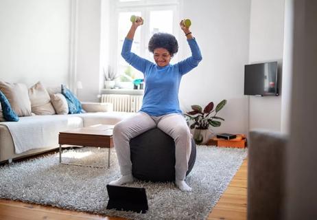 Woman working out on an exercise ball.