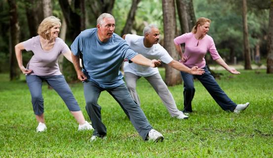 People doing tai chi outside