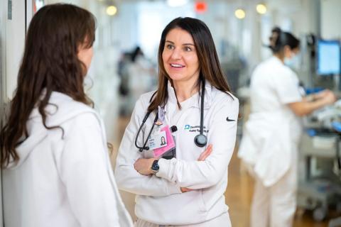 Nurses talking in hallway
