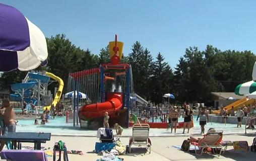 People swimming at pool.