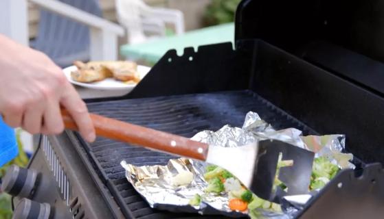 Man cooking on grill