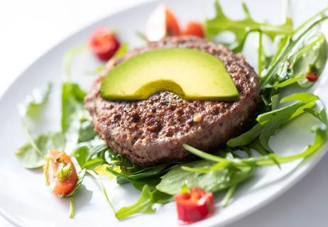 An image of a turkey burger salad.