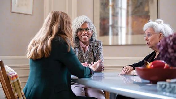 People talking around a table
