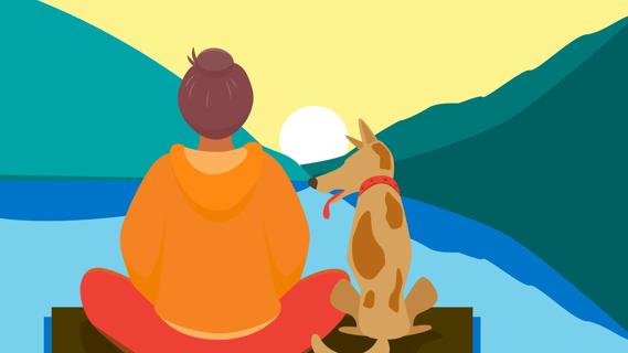 Person sitting on dock at a lake at sunrise, with dog sitting next to them