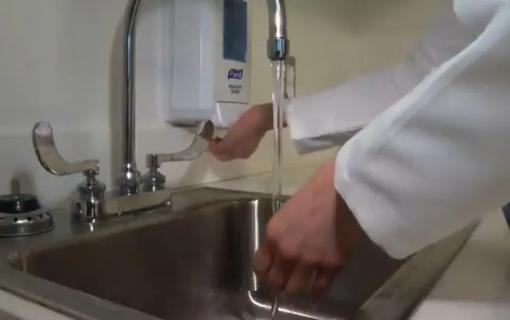 Person washing their hands