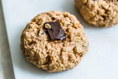 oatmeal cookies with chunk of chocolate on top