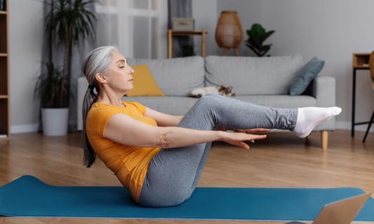 Person doing yoga at home