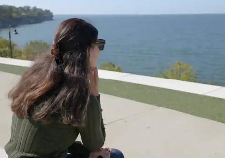 Person looking out at water
