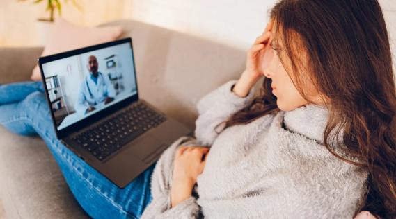 Worried woman has virtual visit with her doctor