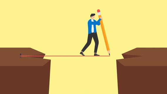 Person holding a giant pencil, drawing a boundary line between two cliffs