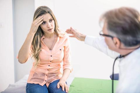 woman with headache