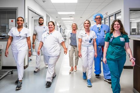 Nurses walking down hall