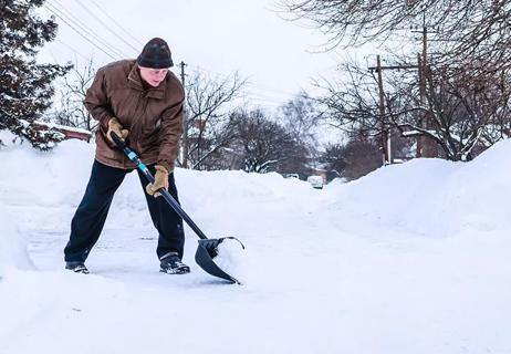 man shoveling snow