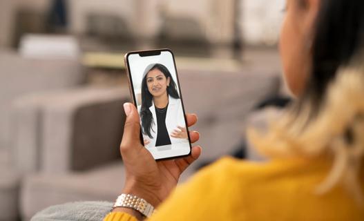 Person talking to healthcare provider on their cell phone