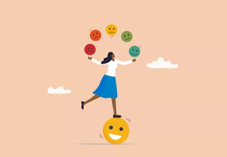 person balancing on a smiley face while juggling other emotions