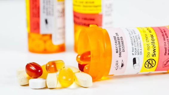 Containers of medications with black box warning labels