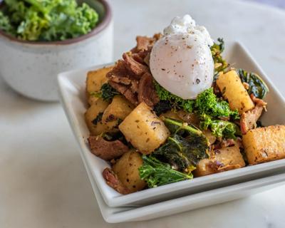 Plate of jicama hash with kale and poached egg